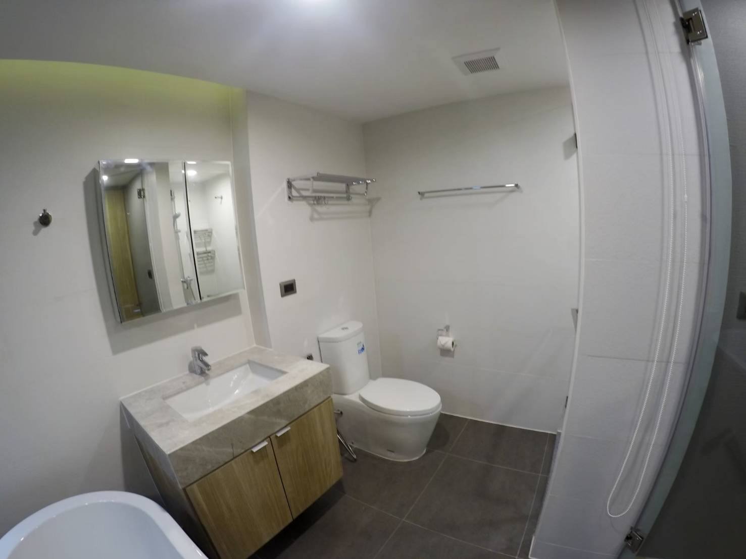 Modern bathroom with vanity and toilet in The Pine Hua Hin one-bedroom condominium