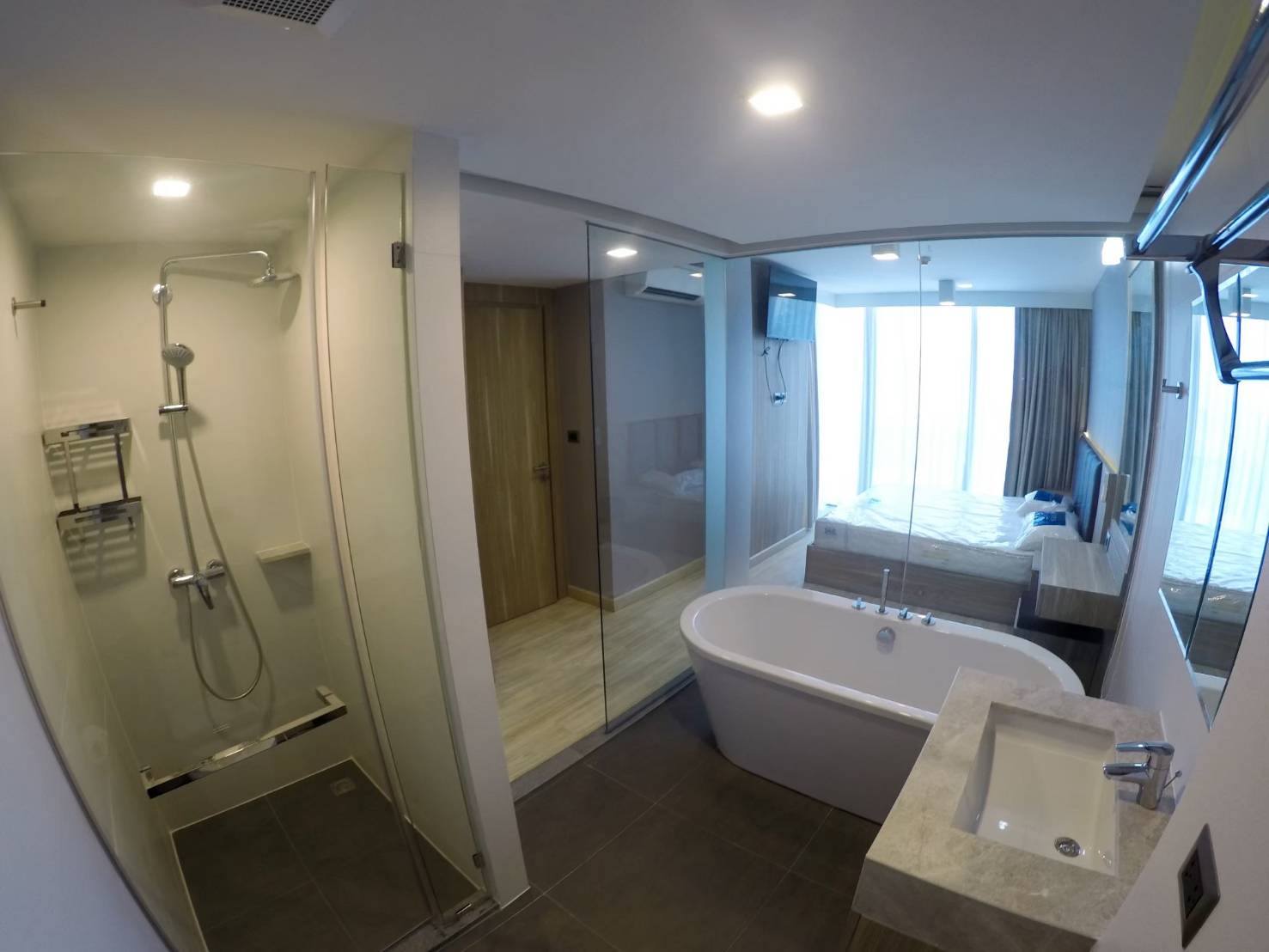 Bathroom with bathtub, separate shower and vanity in The Pine Hua Hin condominium