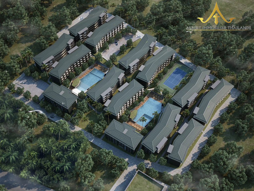 Aerial rendering of Wing Samui Condominium with landscaped grounds, swimming pools and tennis court